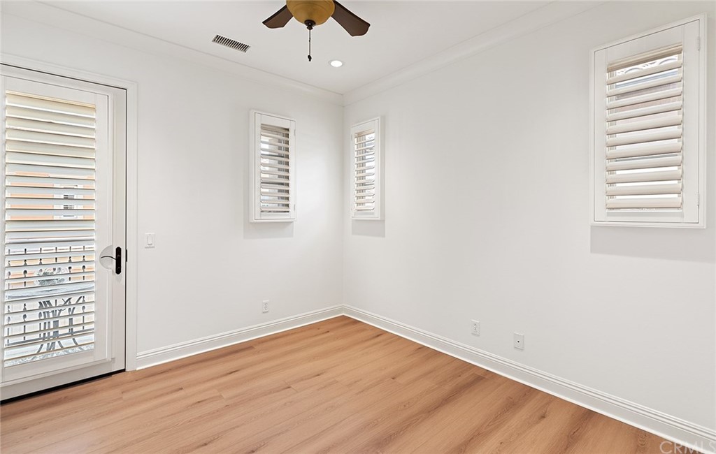 62 Cipresso Irvine, CA 92618 - Photo 22 of 49 wooden floor in an empty room with a window