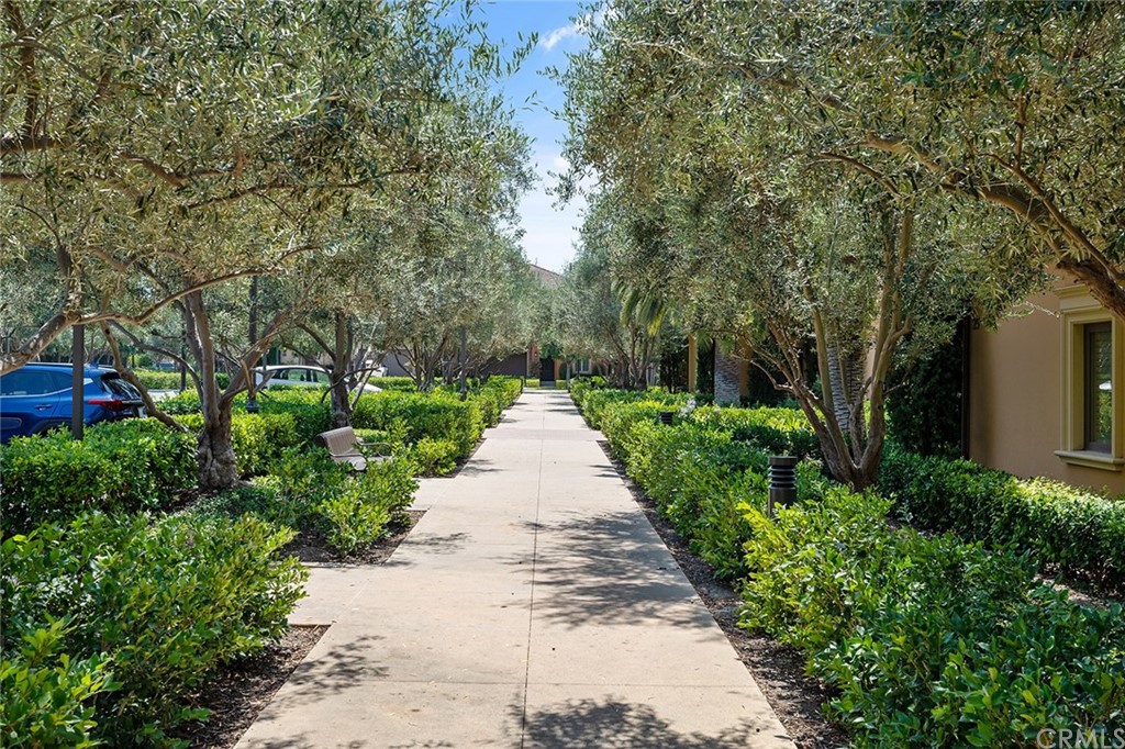 62 Cipresso Irvine, CA 92618 - Photo 40 of 49 a view of a pathway with a wrought fence