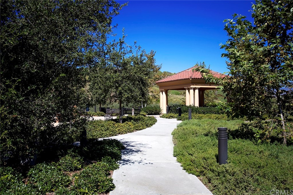 62 Cipresso Irvine, CA 92618 - Photo 46 of 49 a front view of a house with a yard