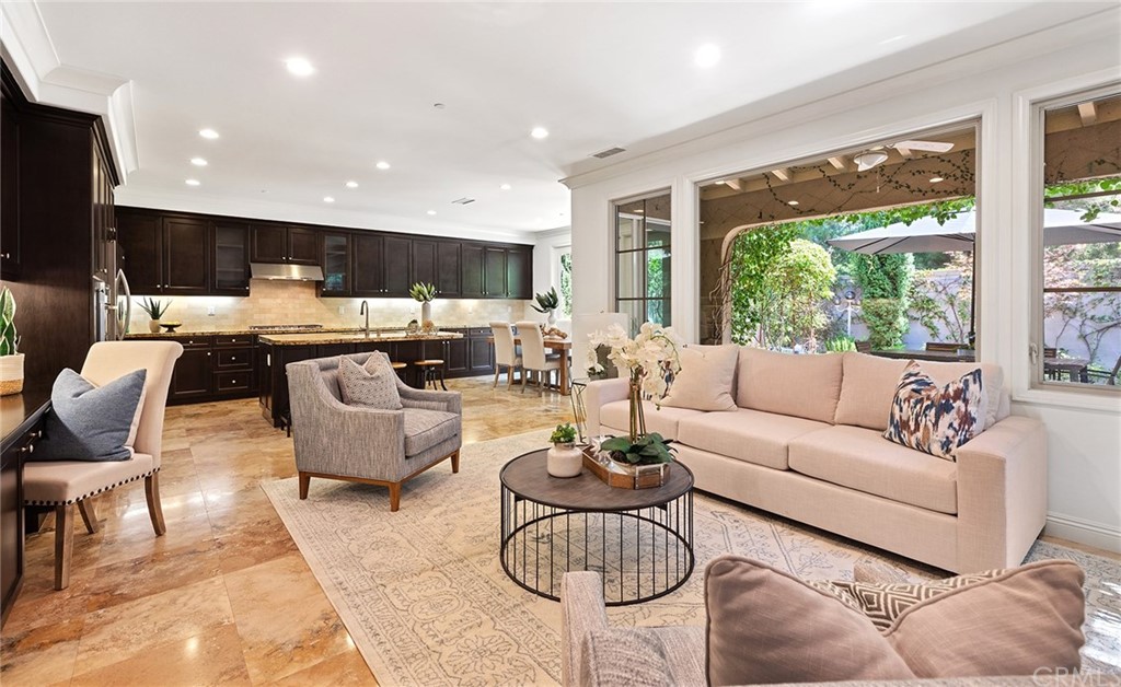 62 Cipresso Irvine, CA 92618 - Photo 5 of 49 a living room with furniture and a large window