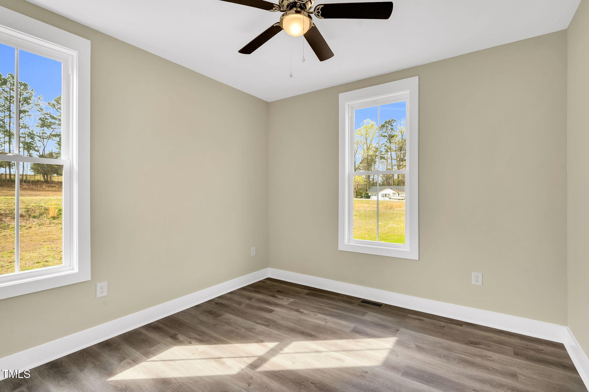 1076 Highway 55 Coats, NC 27521 - Photo 13 of 20 a view of an empty room and window