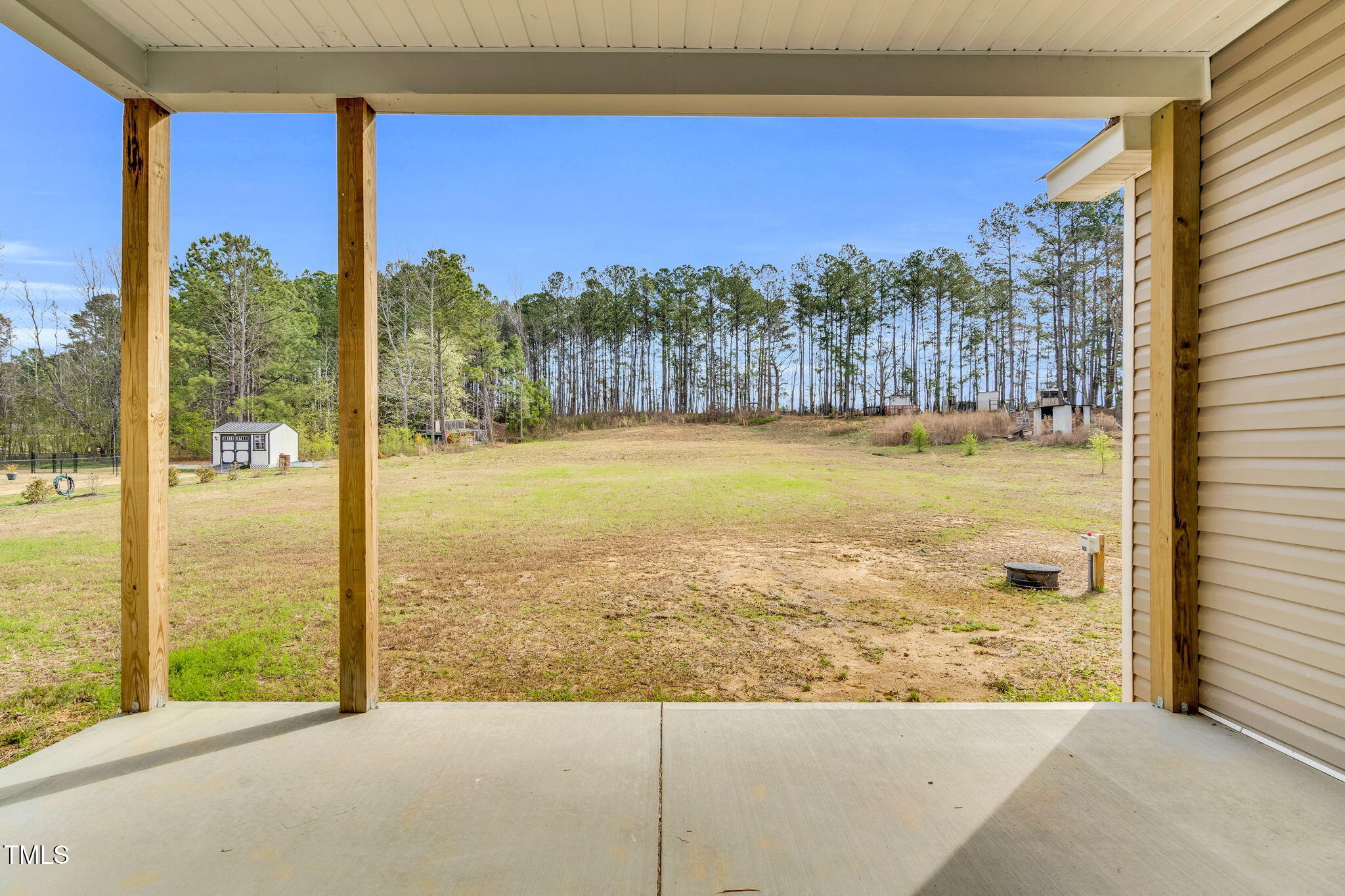1076 Highway 55 Coats, NC 27521 - Photo 19 of 20 a view of a large pool with an ocean view