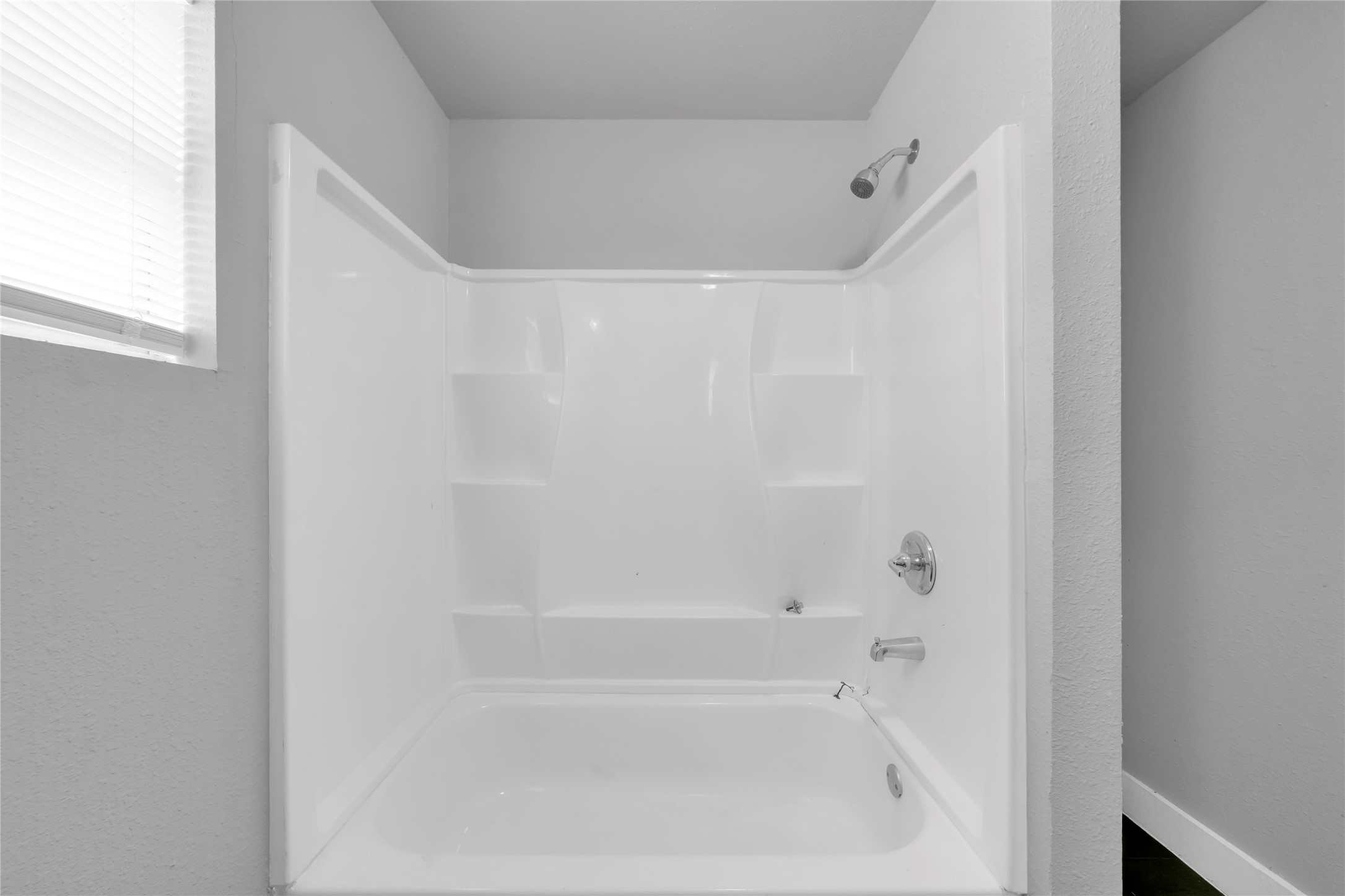 6518 Weston Street, Unit 11 Houston, TX 77021 - Photo 13 of 15 a close up of a bathtub