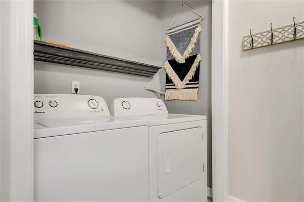 a utility room with dryer and washer