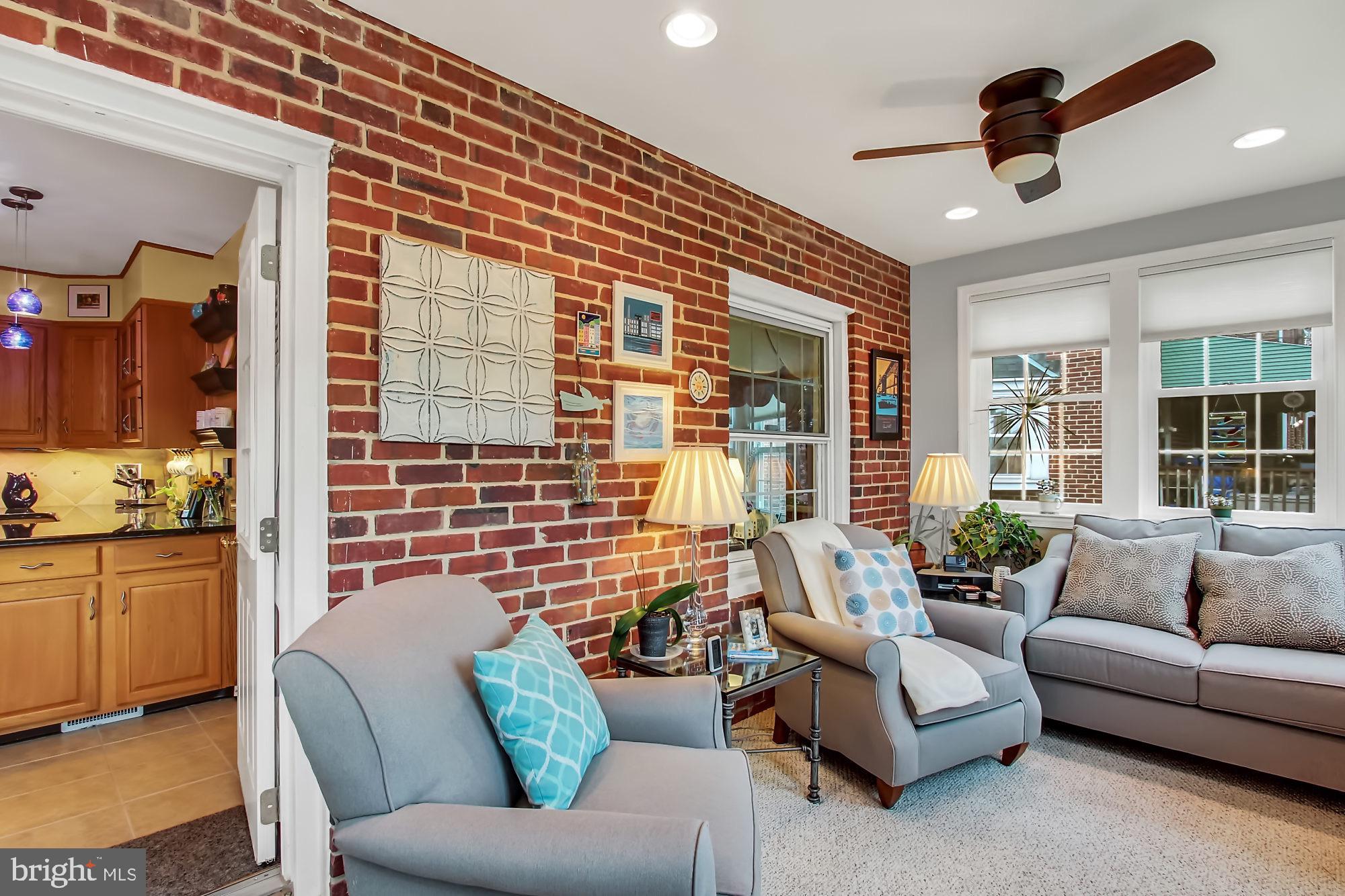 8159 Glen Gary Road Towson, MD 21286 - Photo 4 of 48 Three walls of windows & exposed brick wall
