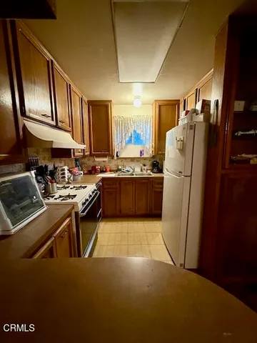 a view of a room with a furniture