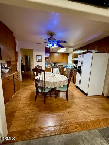 a kitchen with stainless steel appliances granite countertop a stove sink and cabinets