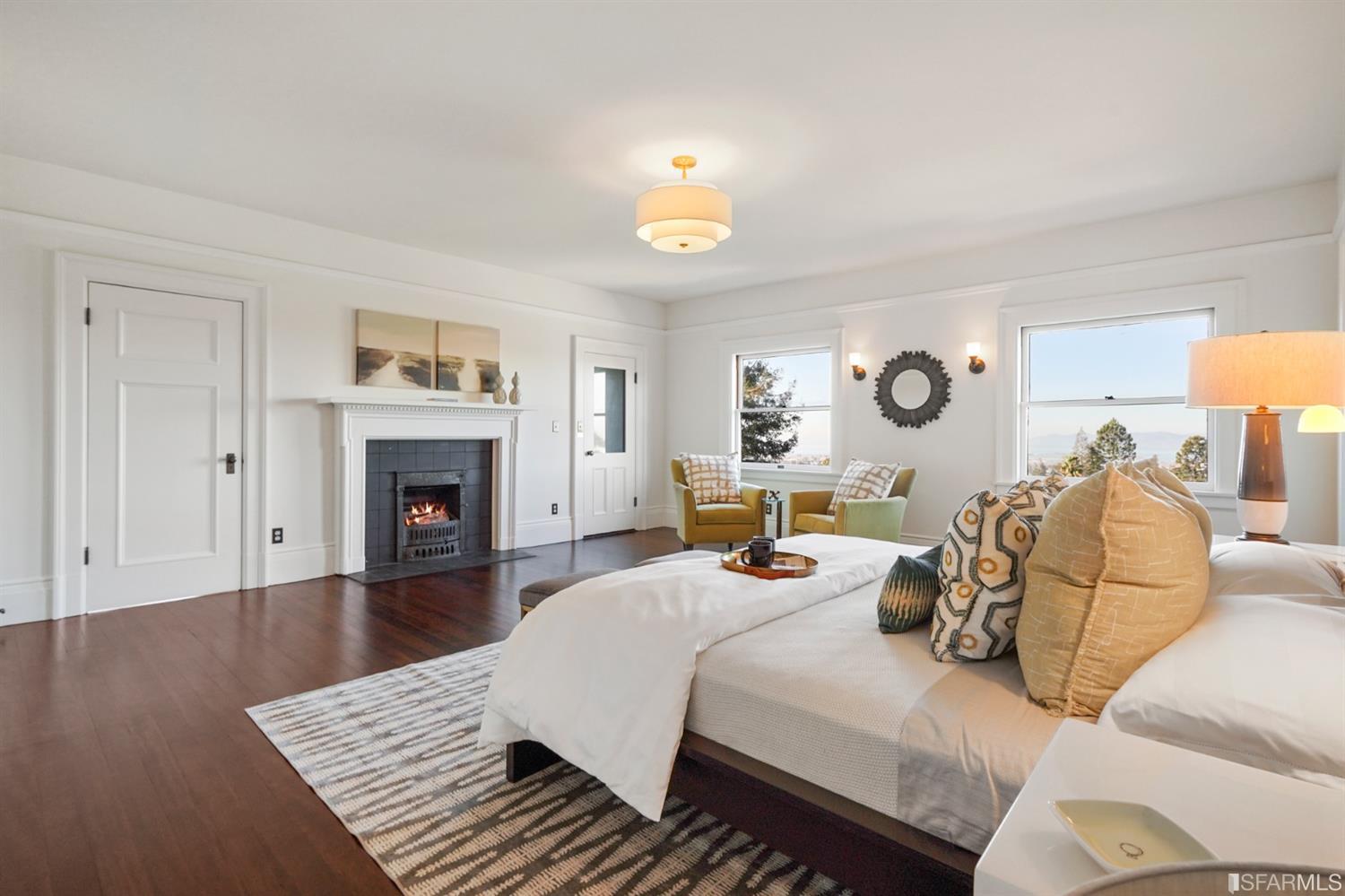 1314 Arch Street Berkeley, CA 94708 - Photo 23 of 90 a bedroom with bed and a fireplace