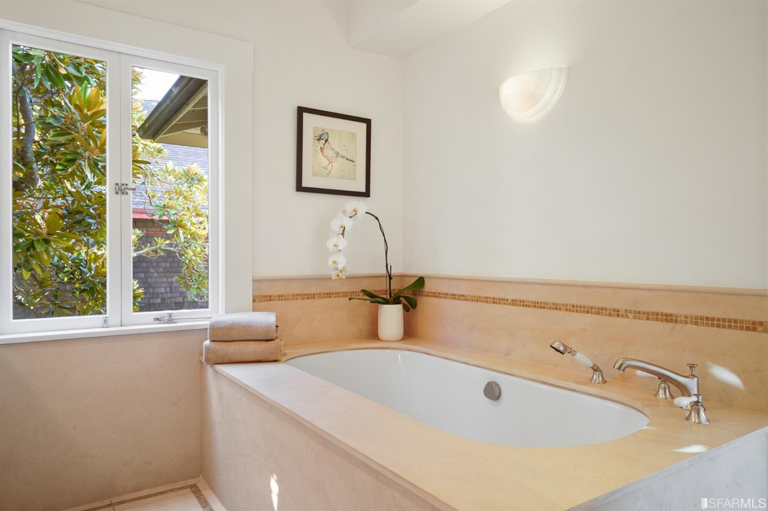 1314 Arch Street Berkeley, CA 94708 - Photo 30 of 90 a bathroom with a sink and a window