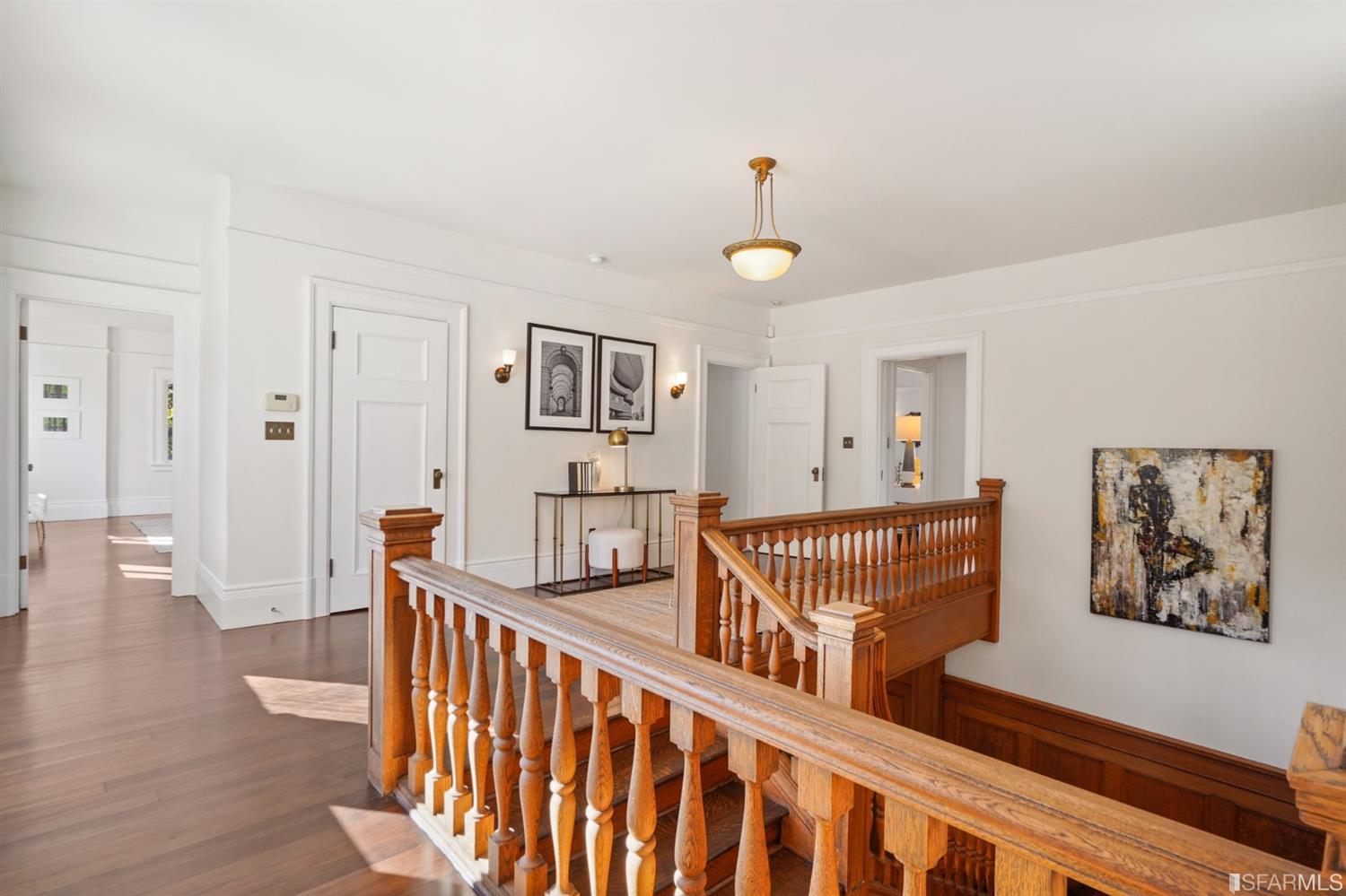 1314 Arch Street Berkeley, CA 94708 - Photo 44 of 90 a view of an empty room with wooden floor and windows