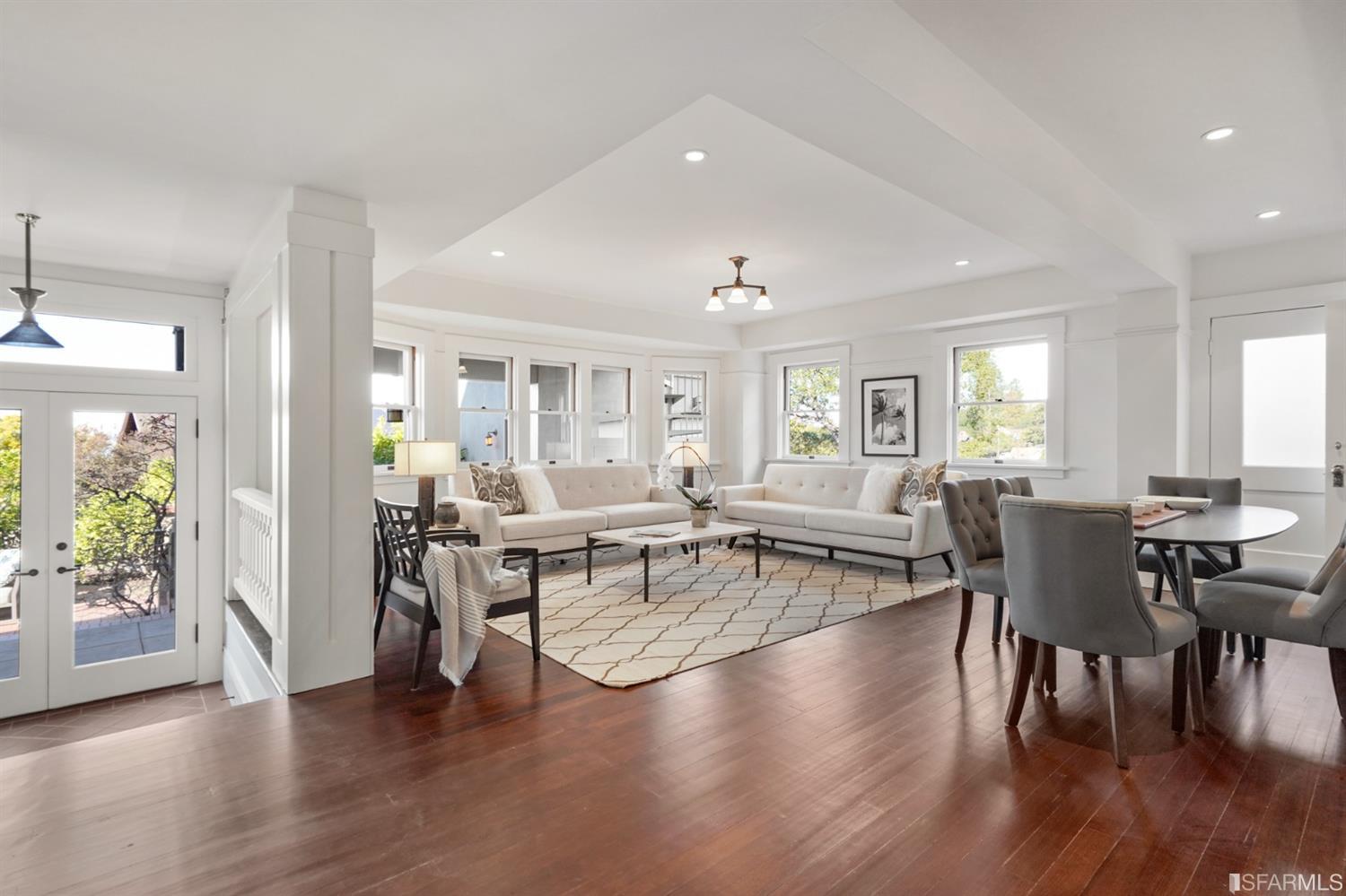1314 Arch Street Berkeley, CA 94708 - Photo 52 of 90 a living room with furniture wooden floor and a large window