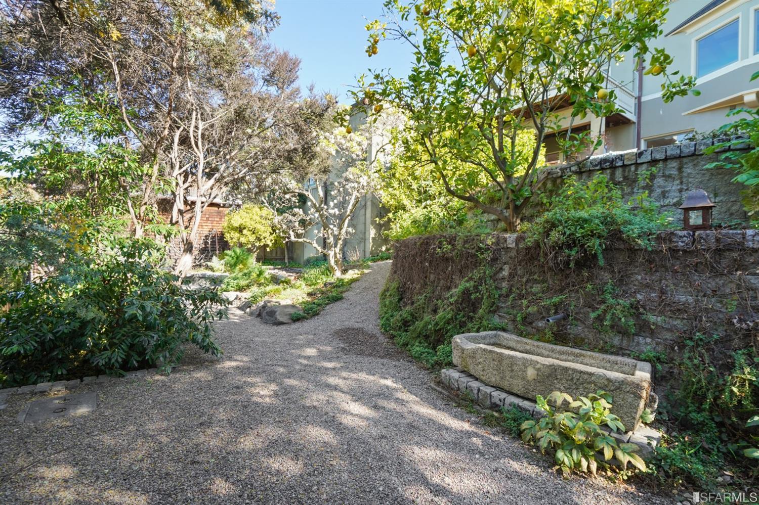 1314 Arch Street Berkeley, CA 94708 - Photo 65 of 90 a view of a pathway with a tree