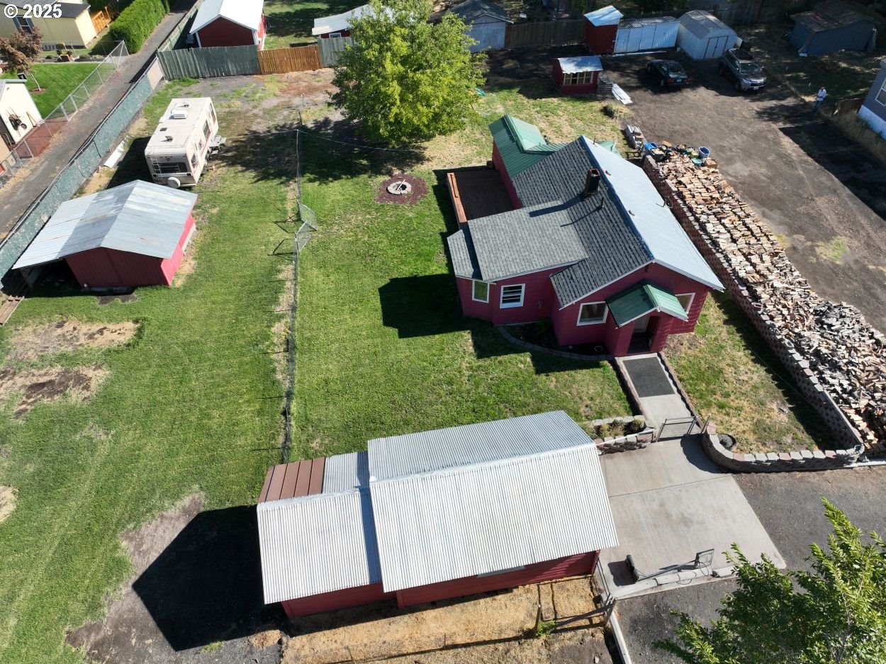 2829 West 9th Street The Dalles, OR 97058 - Photo 14 of 45 an aerial view of a house with garden space and street view