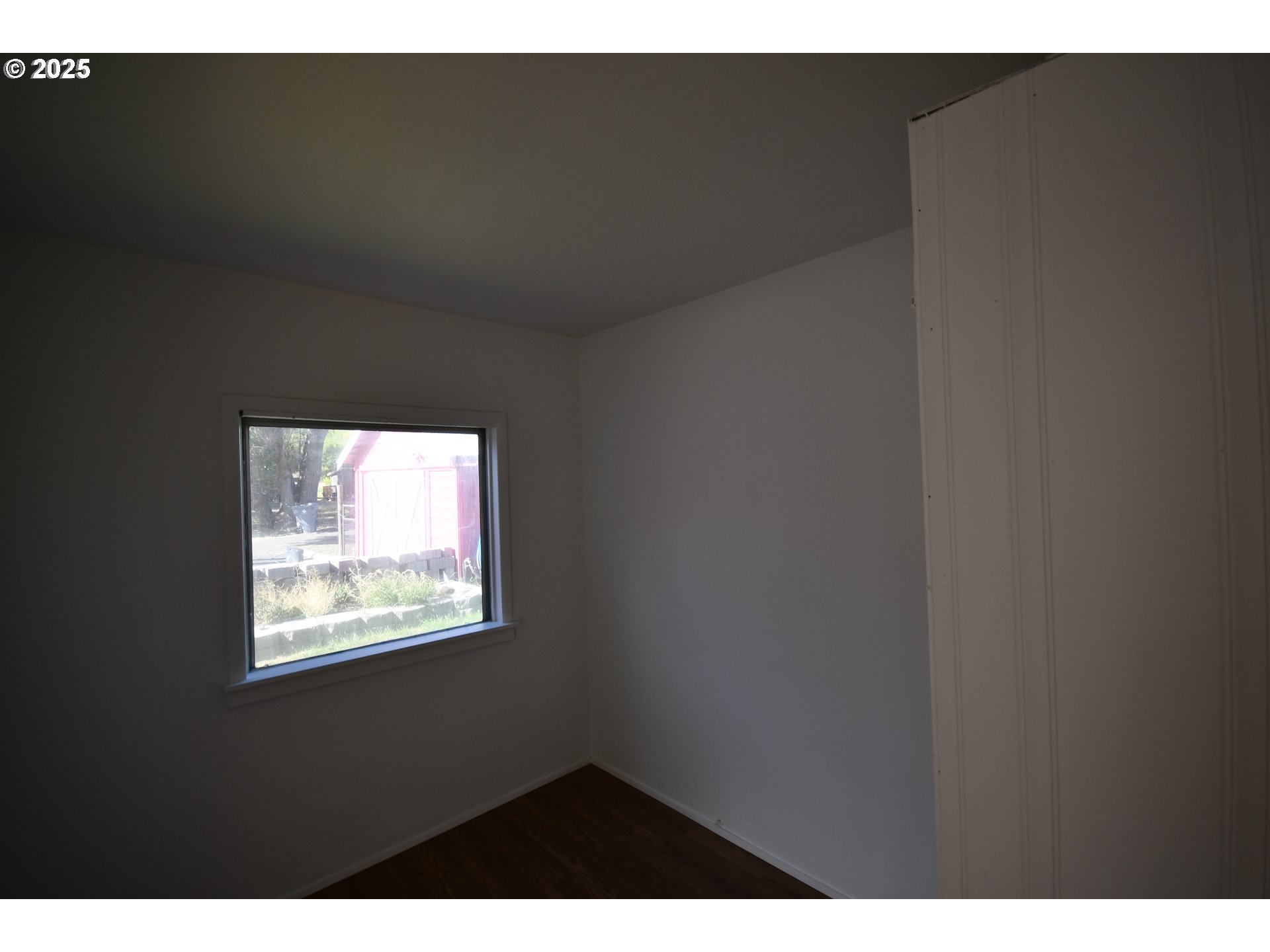 2829 West 9th Street The Dalles, OR 97058 - Photo 29 of 45 a view of an empty room with a window