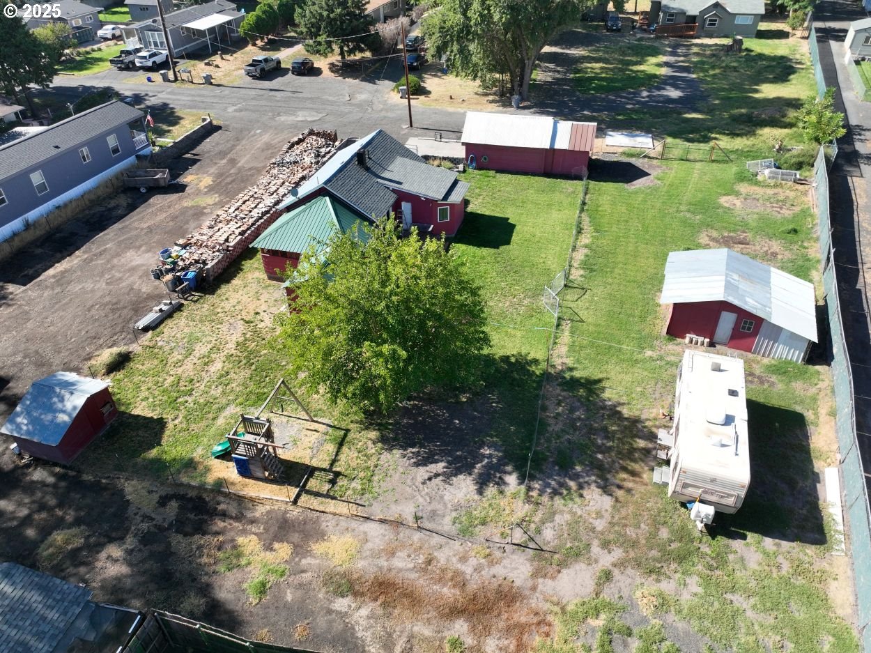 2829 West 9th Street The Dalles, OR 97058 - Photo 3 of 45 an aerial view of residential houses with outdoor space