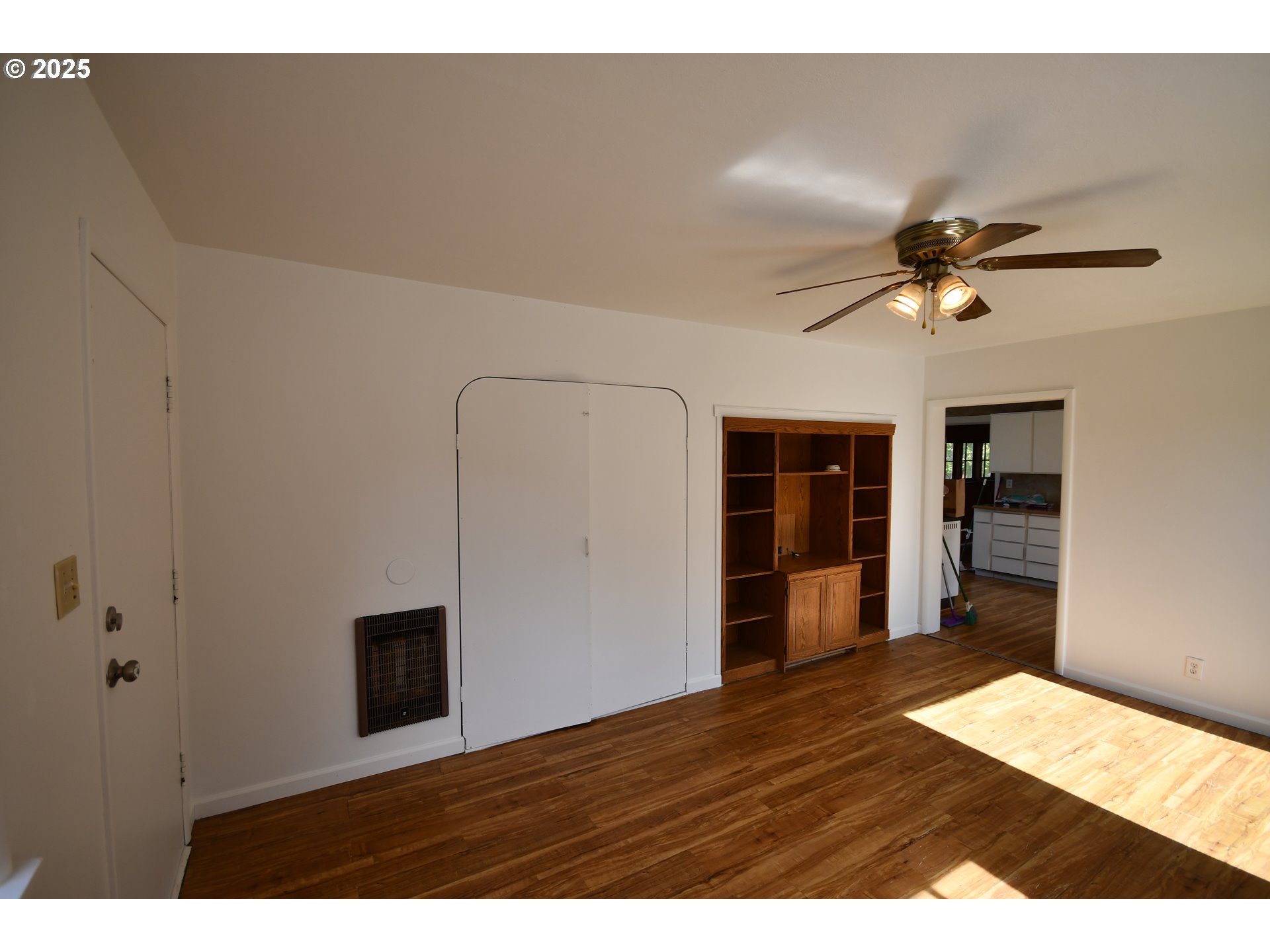 2829 West 9th Street The Dalles, OR 97058 - Photo 31 of 45 a view of an empty room with wooden floor