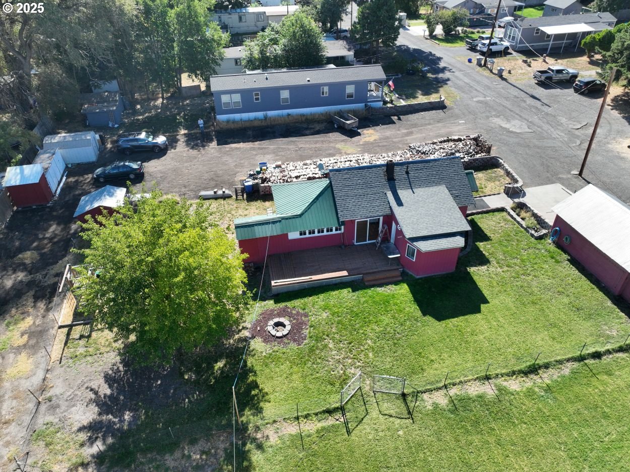 2829 West 9th Street The Dalles, OR 97058 - Photo 5 of 45 an aerial view of a house with yard swimming pool and outdoor seating