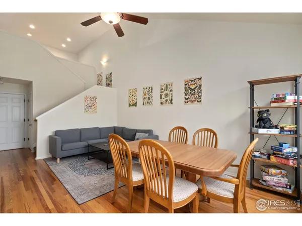 a dining room with furniture and a couch