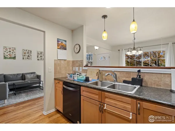 a kitchen with sink and window