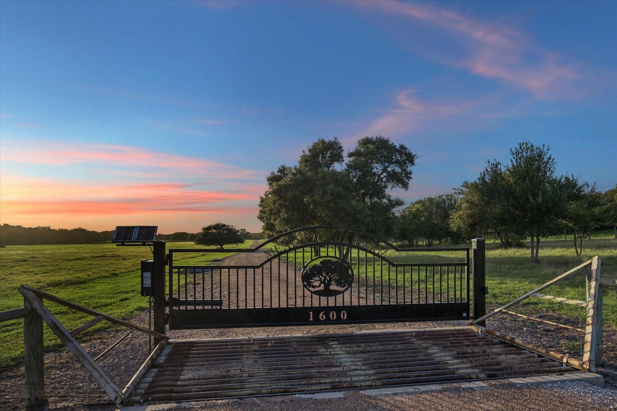 1600 South Weyand Road Round Top, TX 78954 - Photo 37 of 50 Automatic gate showcases the entry of the property.