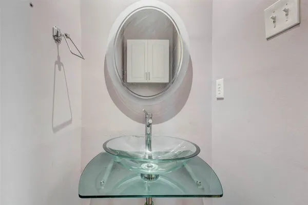 a vase with flowers sitting on a table