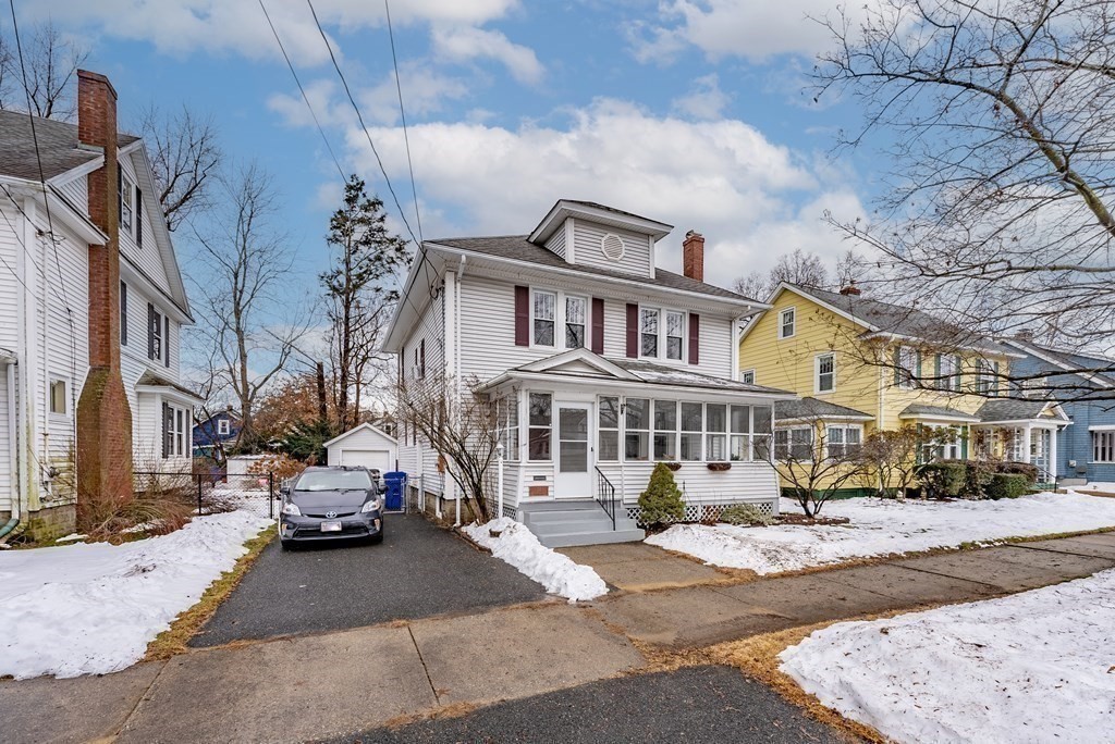 24 Manchester Terrace Springfield, MA 01108 - Photo 1 of 38 a city street lined with buildings and cars