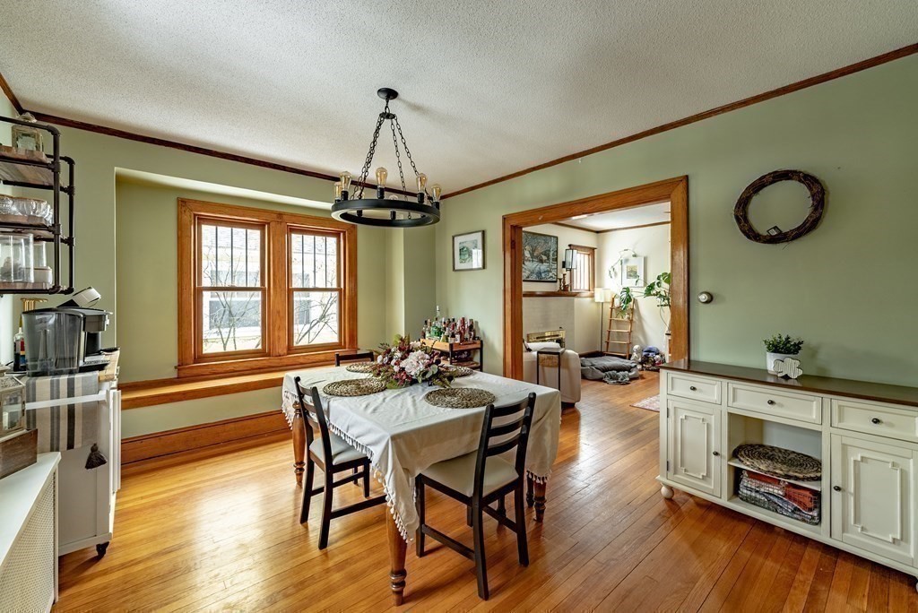24 Manchester Terrace Springfield, MA 01108 - Photo 14 of 38 a view of a dining room with furniture window and wooden floor