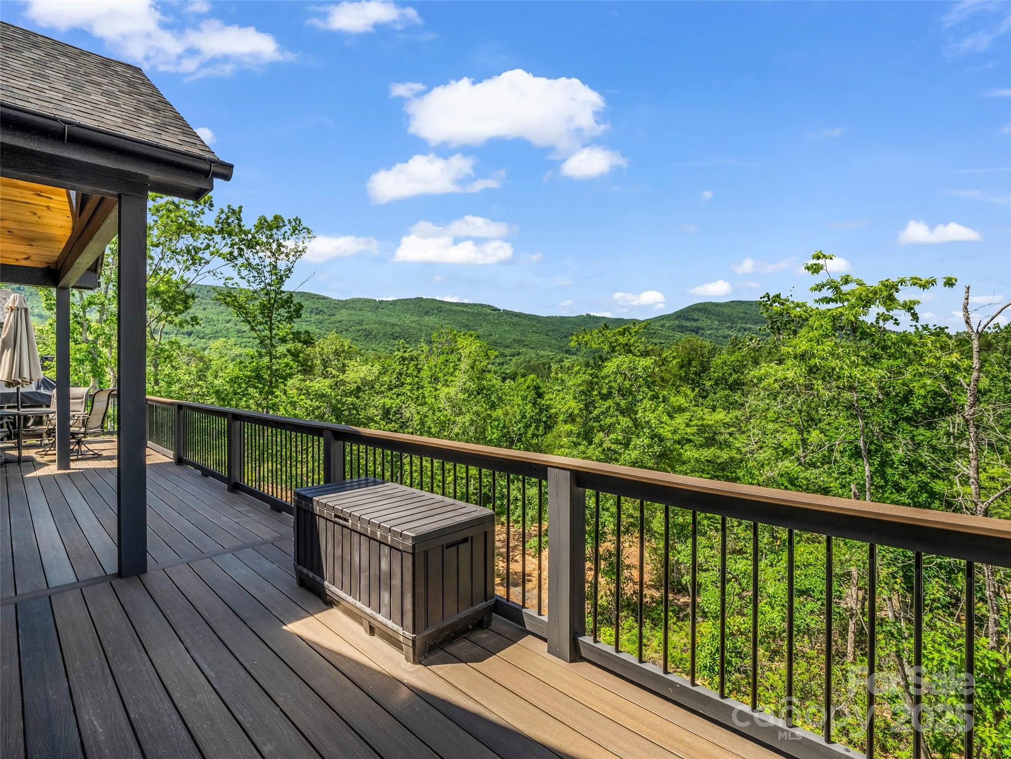 87 Jackson Ridge Ln Mill Spring Mill Spring, NC 28756 - Photo 33 of 42 a view of a two chairs in the balcony