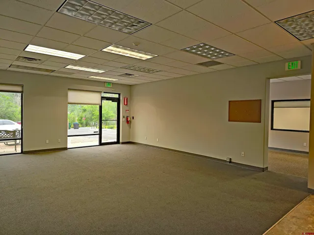 a view of empty room with windows
