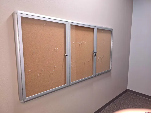 an empty room with closet area