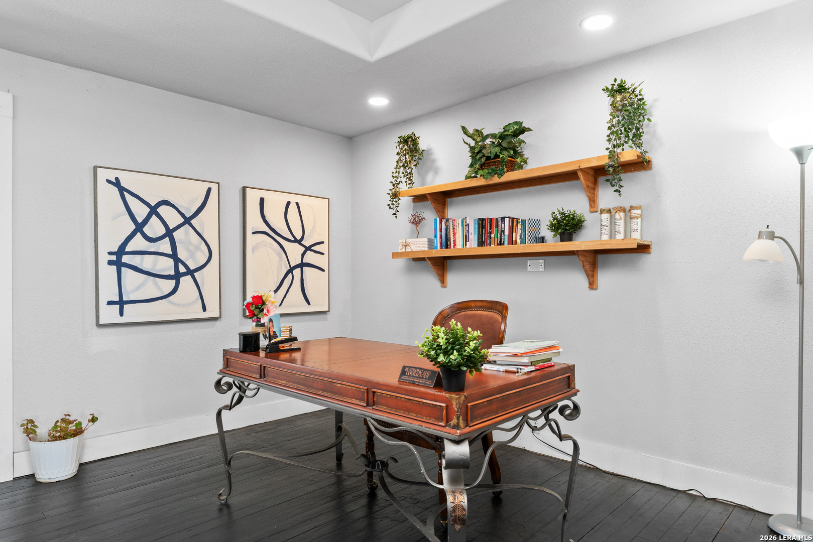 15285 South Skaggs Road Atascosa, TX 78002 - Photo 12 of 36 a view of a workspace with furniture and wooden floor
