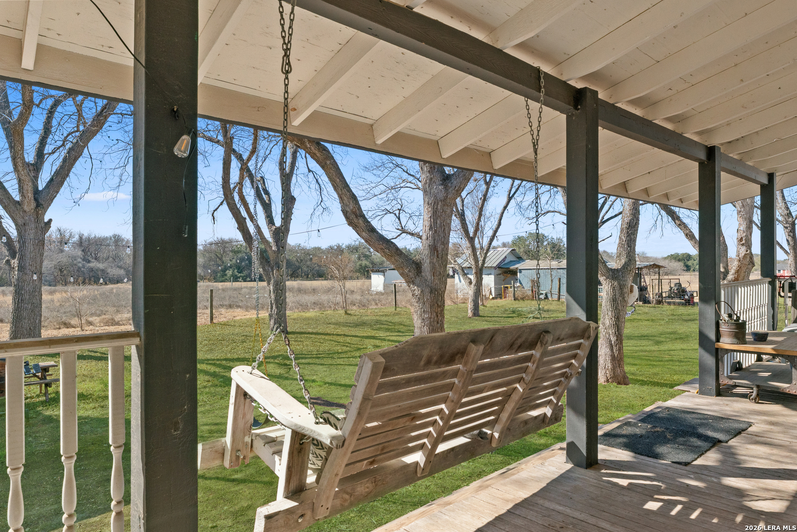 15285 South Skaggs Road Atascosa, TX 78002 - Photo 28 of 36 a view of a wooden deck