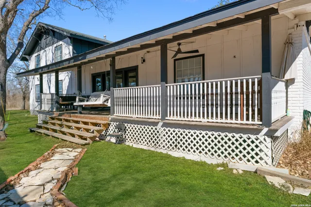 a room with furniture and a flat screen tv