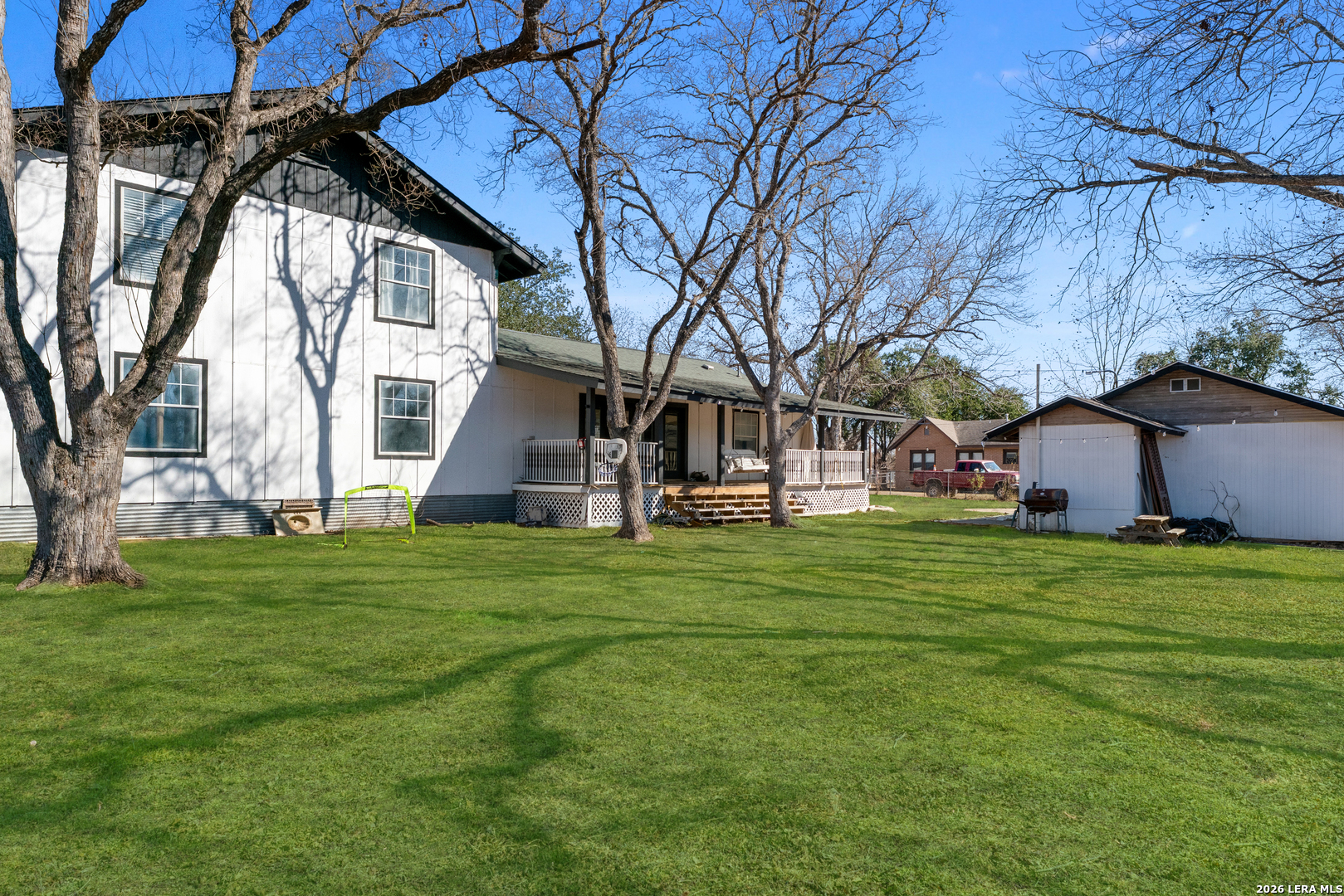 15285 South Skaggs Road Atascosa, TX 78002 - Photo 31 of 36 a front view of house with a garden