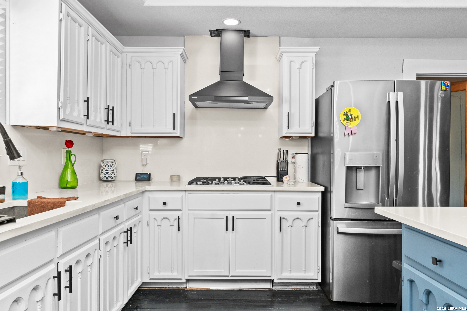 15285 South Skaggs Road Atascosa, TX 78002 - Photo 7 of 36 a kitchen with stainless steel appliances granite countertop a refrigerator stove and sink