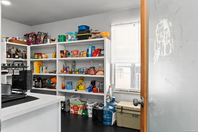 a room with storage and utility