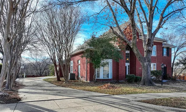 a view of a house with a snow in front of it