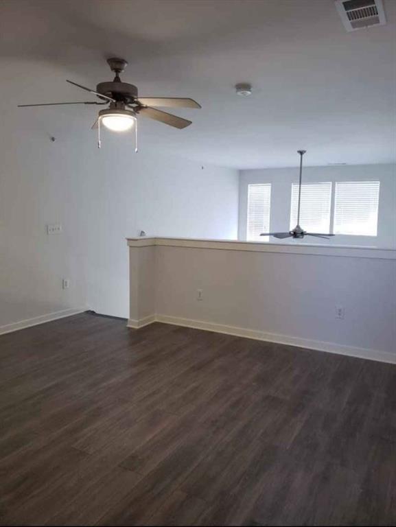 1910 Bennett Avenue Dallas, TX 75206 - Photo 7 of 9 a view of wooden floor and cabinet in a room