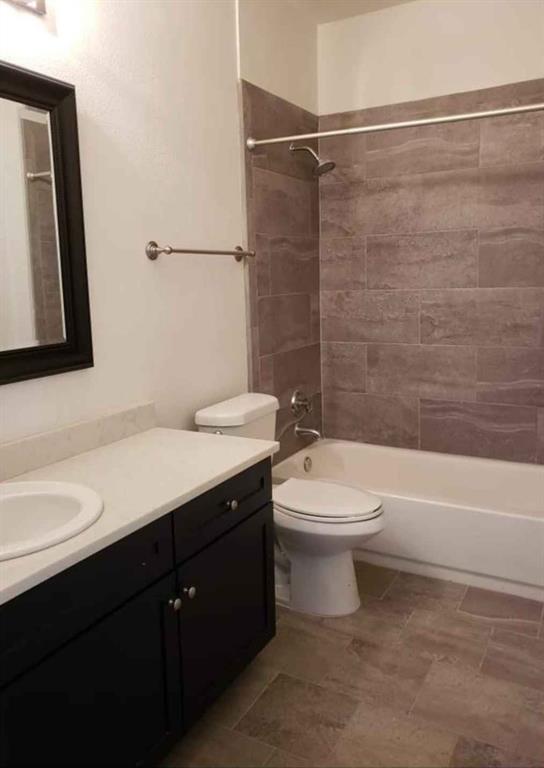 1910 Bennett Avenue Dallas, TX 75206 - Photo 9 of 9 a bathroom with a sink a toilet and shower