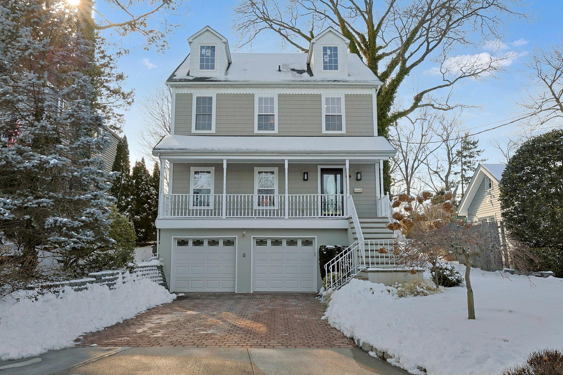 38 Weeks Place New Rochelle, NY 10801 - Photo 1 of 1 Front of home with side by side covered porch!