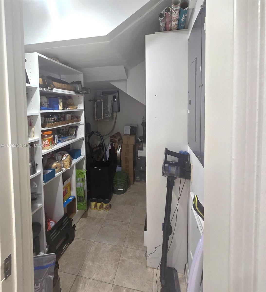 4 Turtle Walk, Unit 4 Key Biscayne, FL 33149 - Photo 15 of 29 a view of walk in closet with clothes and shoes