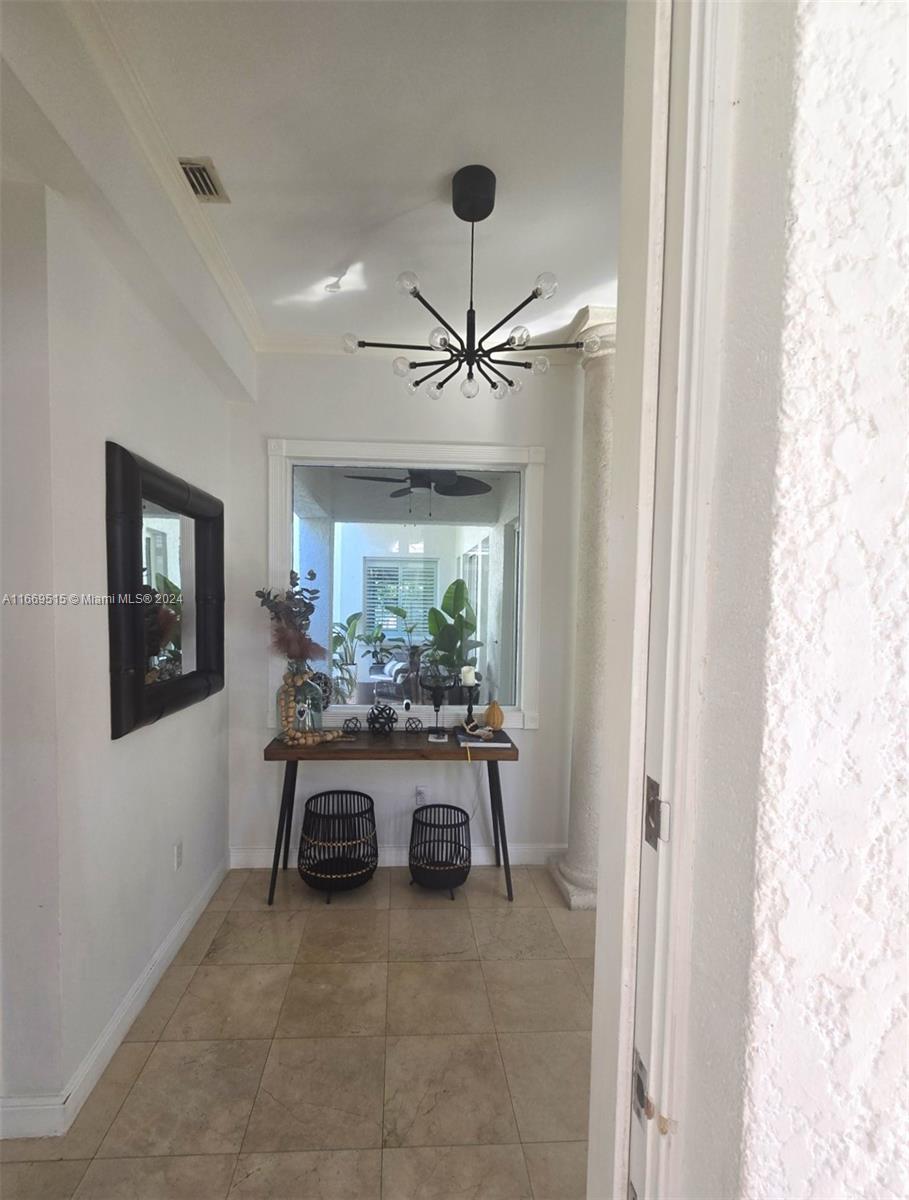 4 Turtle Walk, Unit 4 Key Biscayne, FL 33149 - Photo 5 of 29 a view of workspace with furniture and a window