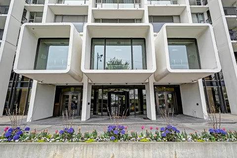 a front view of a building with an outdoor space