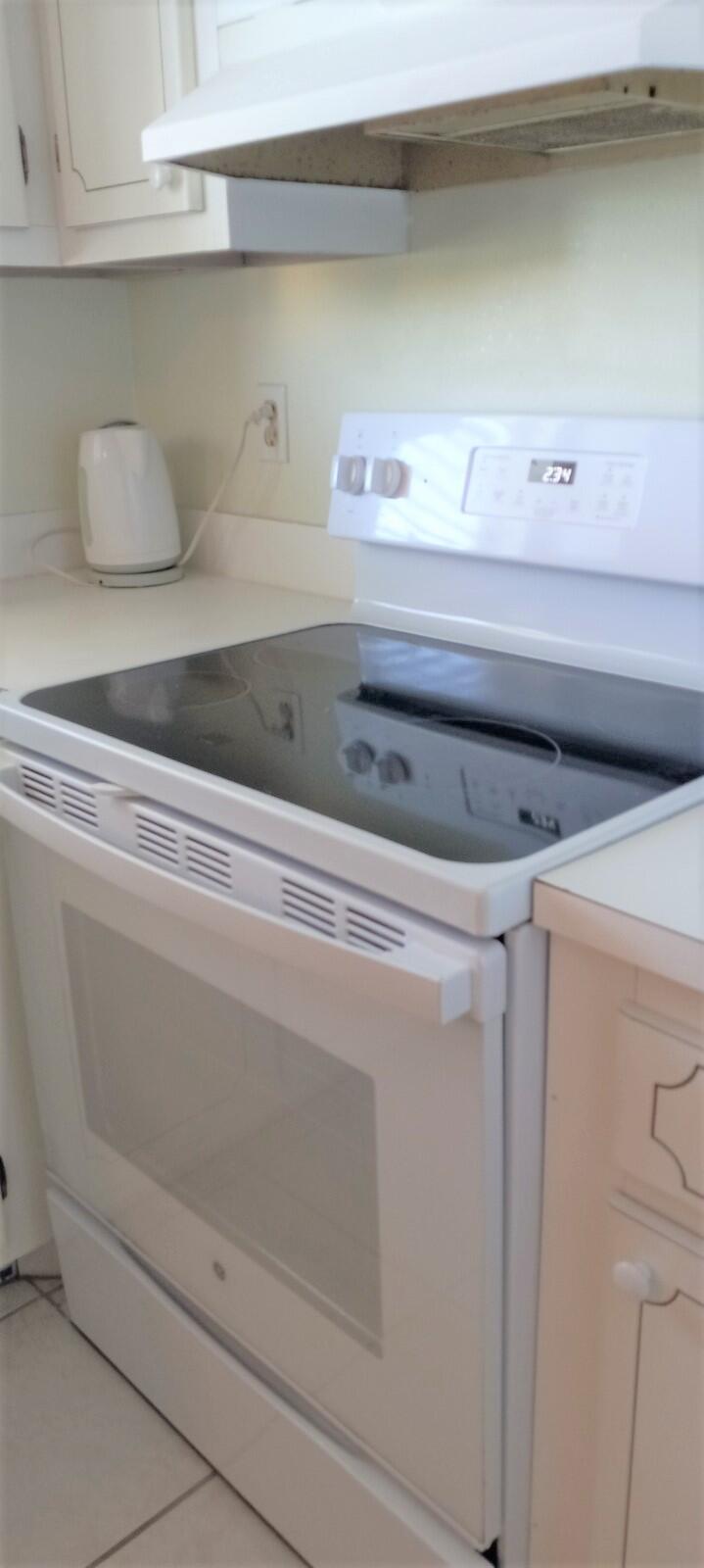 9355 Southwest 8th Street, Unit 402 Boca Raton, FL 33428 - Photo 4 of 5 a close view of closet