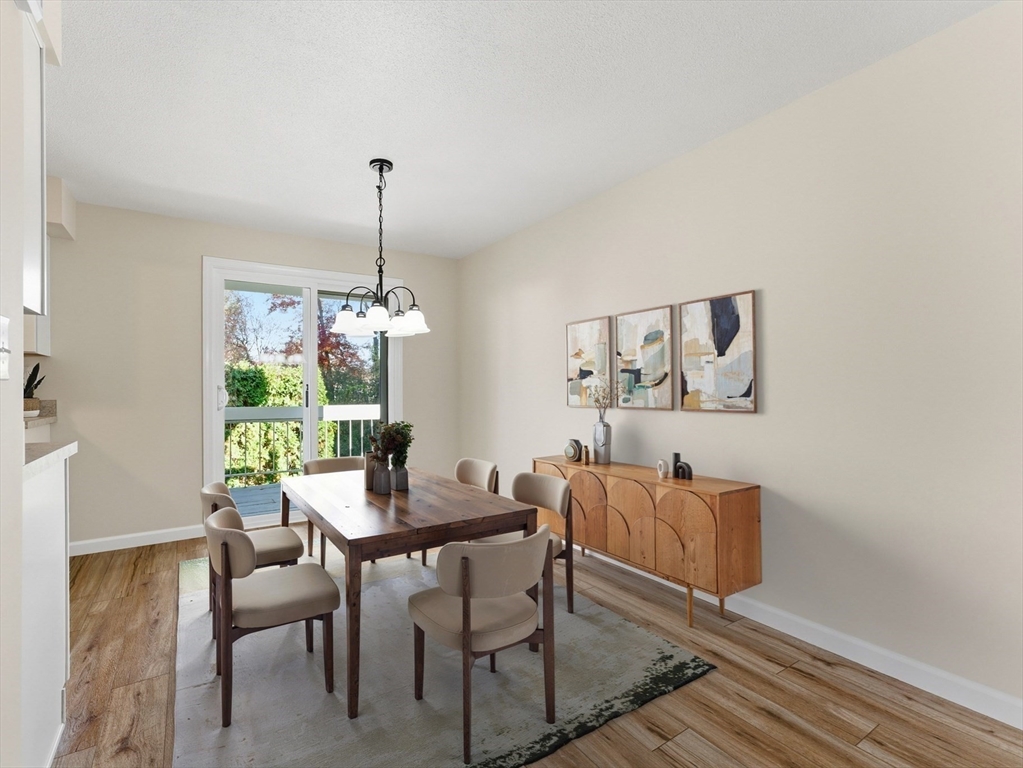 84 Fuller Street, Unit 1 Ludlow, MA 01056 - Photo 12 of 34 a dining room with furniture and window