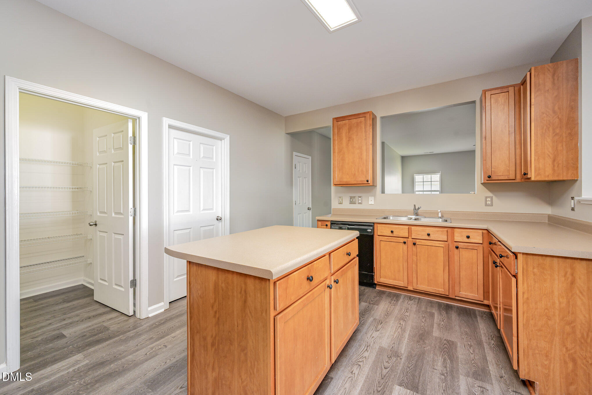 1508 Bancroft Court Graham, NC 27253 - Photo 10 of 33 a kitchen with stainless steel appliances granite countertop a sink and wooden cabinets