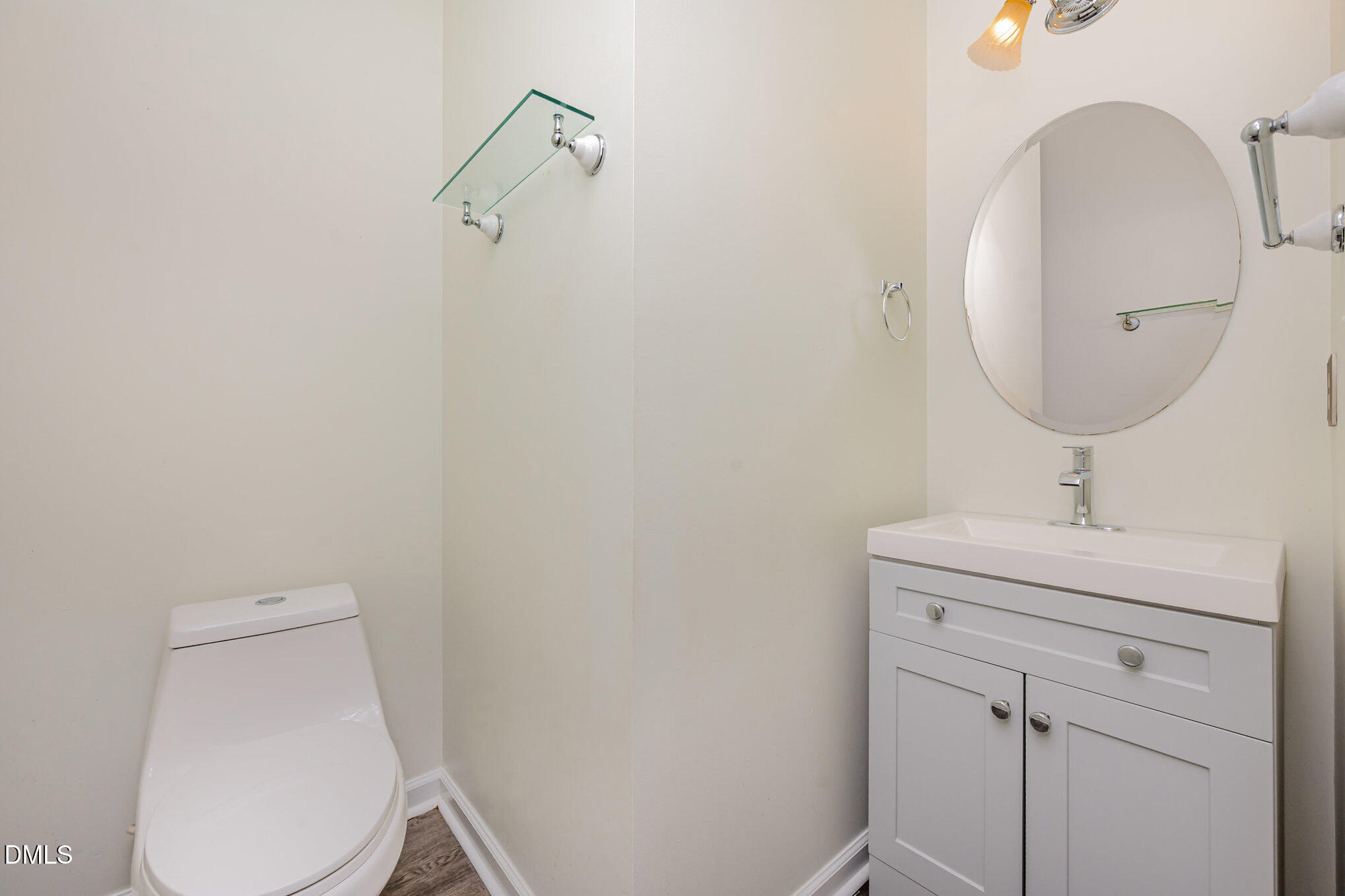 1508 Bancroft Court Graham, NC 27253 - Photo 13 of 33 a bathroom with a toilet sink and mirror