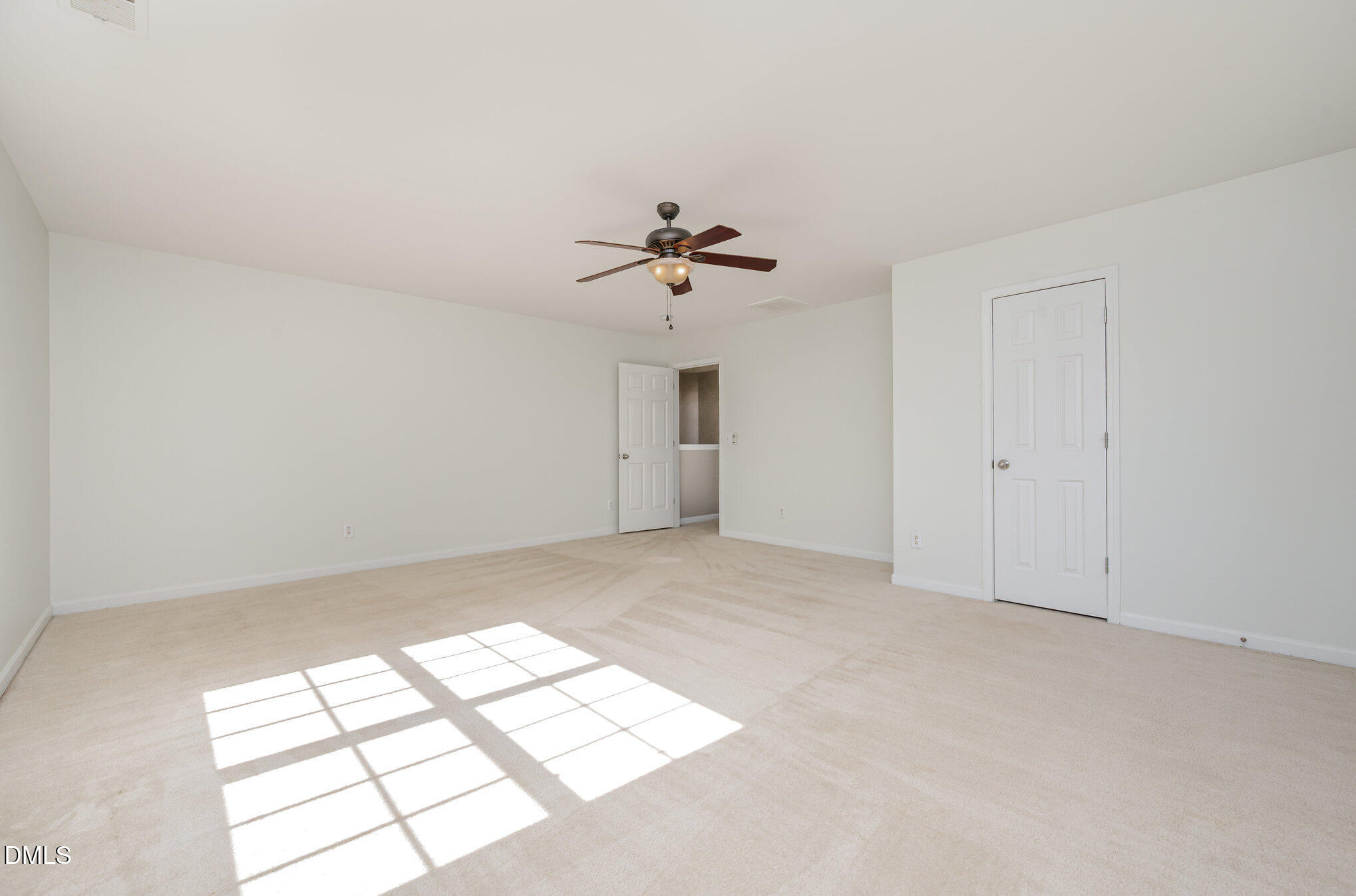 1508 Bancroft Court Graham, NC 27253 - Photo 20 of 33 wooden floor in an empty room with a window