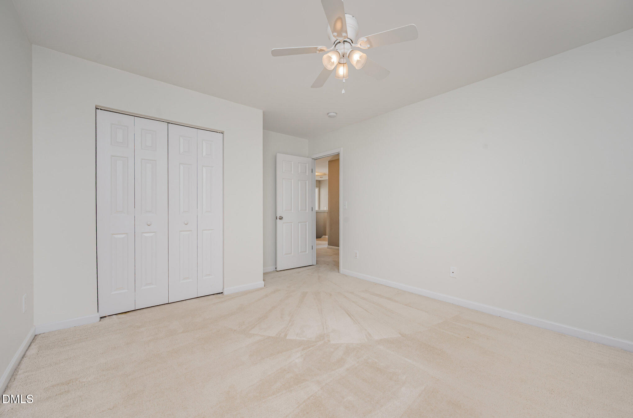 1508 Bancroft Court Graham, NC 27253 - Photo 22 of 33 a view of an empty room with a ceiling fan