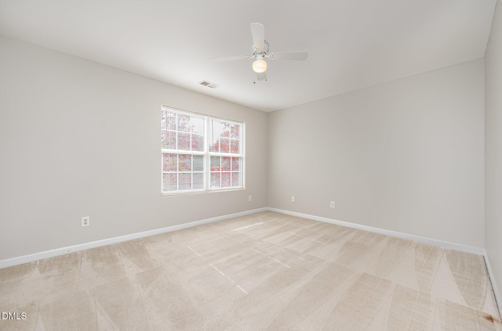 1508 Bancroft Court Graham, NC 27253 - Photo 24 of 33 an empty room with windows and closet